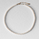 Collier Harry en perles d’eau douce naturelles AAA et acier inoxydable doré, bijou unisexe homme et femme élégant et intemporel. Perle de culture rondes
